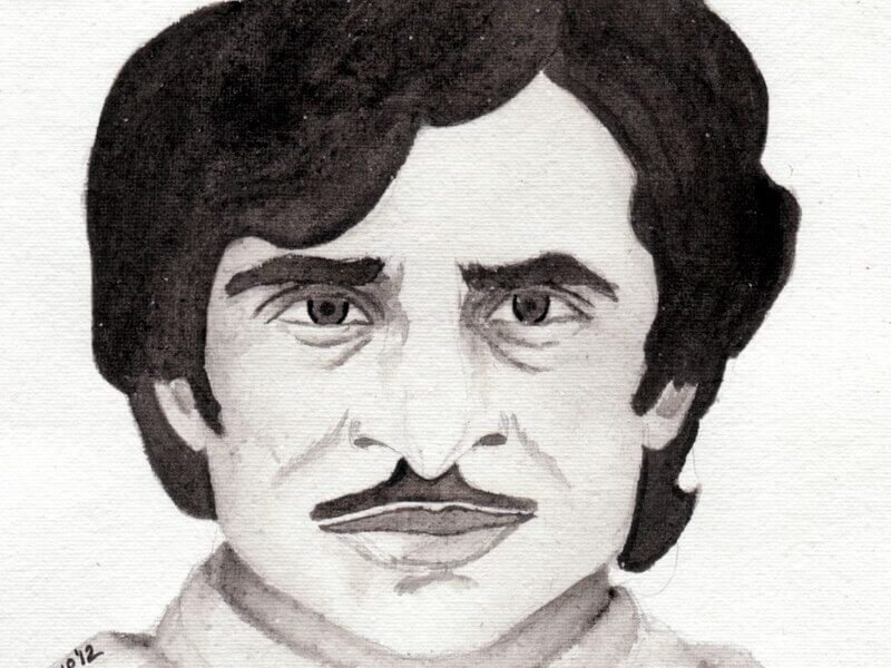 A black-and-white watercolor painting of Jayanta Hazarika, depicting his distinct facial features, wavy hair, and mustache, reflecting his charismatic persona.