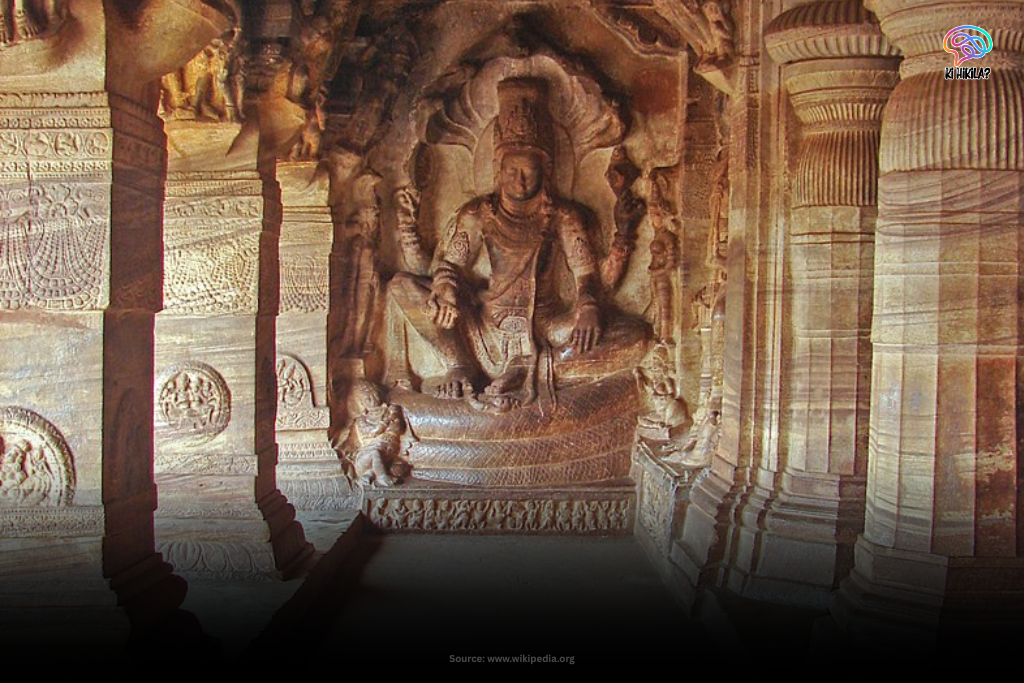 Stone sculpture of Lord Vishnu inside Badami Cave Temple, Karnataka.
