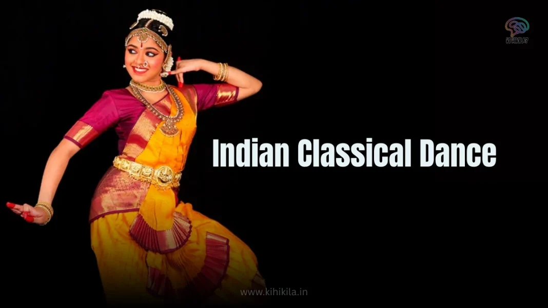 A woman in a traditional costume performing an Indian classical dance pose.